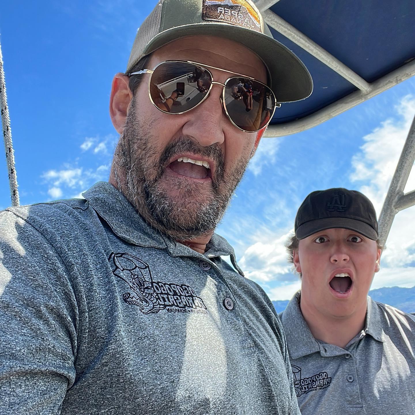 Luke and Ogopogo Parasailing team member boating